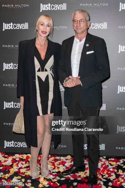 Francesca Caetani D'Aragona Lovatelli and Enzo De Feo attend Paris Hilton ProDNA lunch party at Just Cavalli Cafe on October 20, 2018 in Milan, Italy.