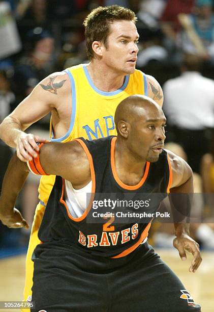 Mark McGrath and Morris Chestnut during NBA All-Star Celebrity Game at Los Angeles Convention Center in Los Angeles, California, United States.