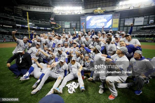 The Los Angeles Dodgers celebrate after defeating the Milwaukee Brewers in Game Seven to win the National League Championship Series at Miller Park...