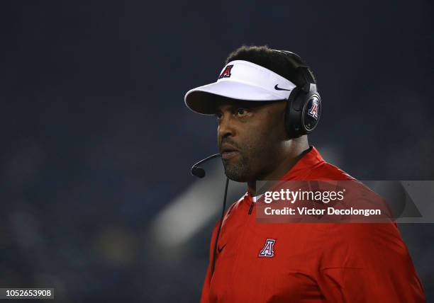 Head coach Kevin Sumlin of the Arizona Wildcats looks on from the sideline during the NCAA college football game against the UCLA Bruins at the Rose...