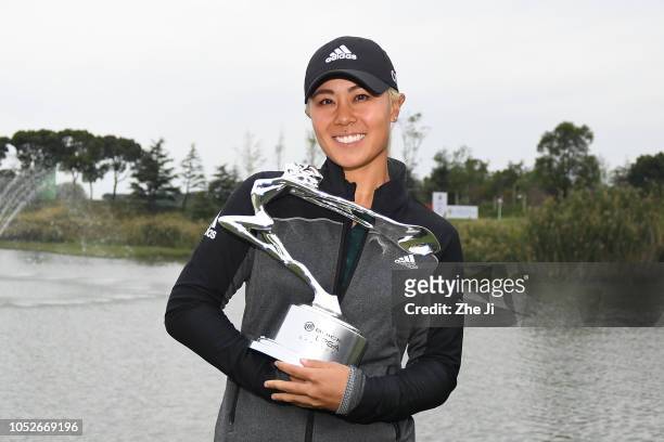 Danielle Kang of the United States celebrates after winning the Buick LPGA Shanghai 2018 at Shanghai Qizhong Garden Golf Club on October 21, 2018 in...