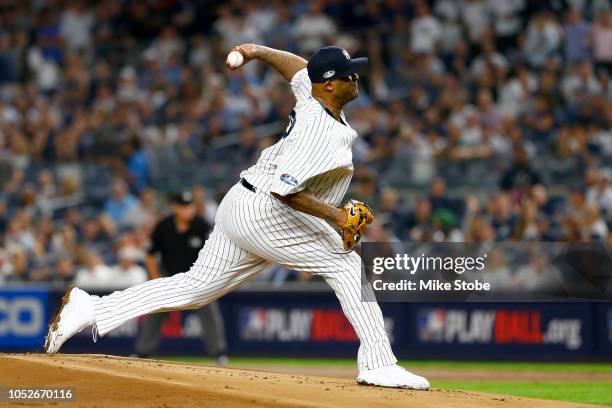 Sabathia of the New York Yankees throws a pitch against the Boston Red Sox during the first inning in Game Four of the American League Division...