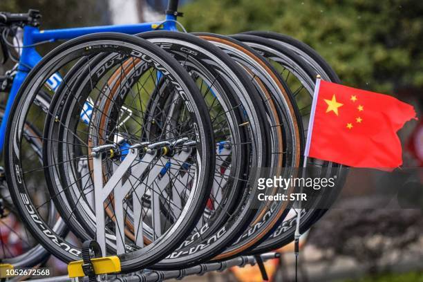 Chinese national flag is seen during the sixth stage of the Tour of Guangxi race in Guilin in China's southern Guangxi region on October 21, 2018. /...