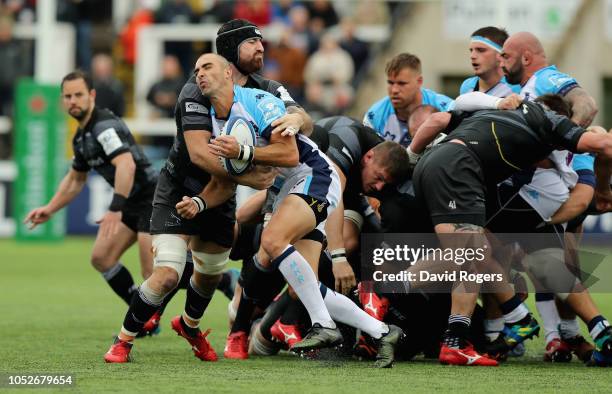 Ruan Pienaar of Montpellier is held by Gary Graham during the Champions Cup match between Newcastle Falcons and Montpellier Herault Rugby at Kingston...