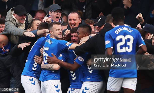 Ryan Kent of Rangers celebrates with team mates and supporters after he scores his team's opening goal during the Scottish Ladbrokes Premiership...