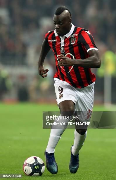 Nice's Italian forward Mario Balotelli controls the ball during the French L1 football match between Nice and Marseille at "Allianz Riviera" stadium...