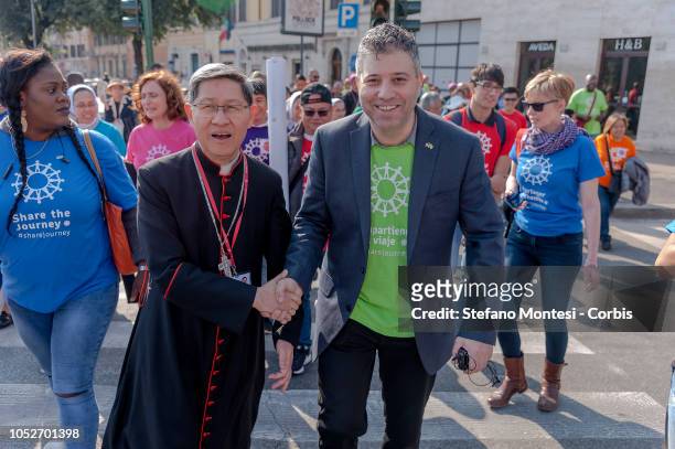 Global Solidarity Walk "Share the Journey" with the Cardinal Luis Tagle, President of Caritas Internationalis, on the streets of the city, from the...