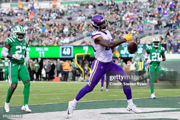 Latavius Murray of the Minnesota Vikings celebrates his third quarter rushing touchdown against the New York Jets at MetLife Stadium on October 21,...