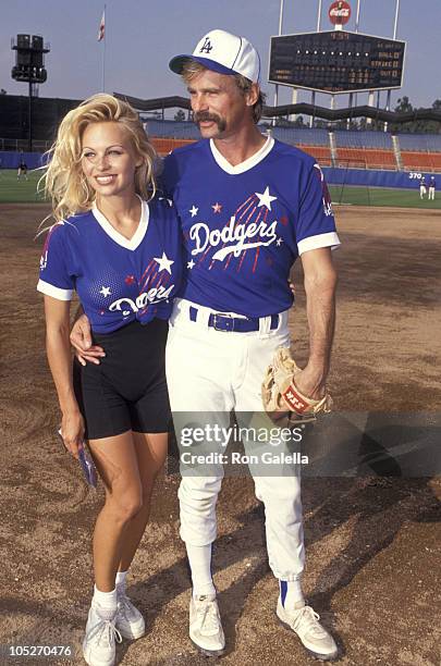 Pamela Anderson and Richard Dean Anderson during Hollywood Stars Celebrity Baseball Game at Dodgers Stadium in Los Angeles, California, United States.