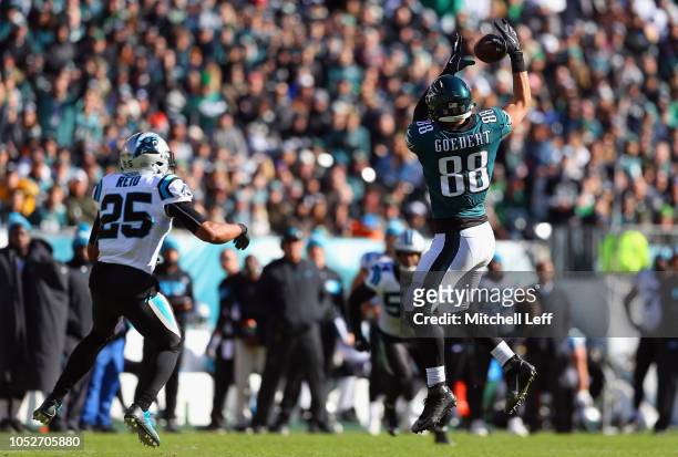 Tight end Dallas Goedert of the Philadelphia Eagles makes a catch against strong safety Eric Reid of the Carolina Panthers during the third quarter...