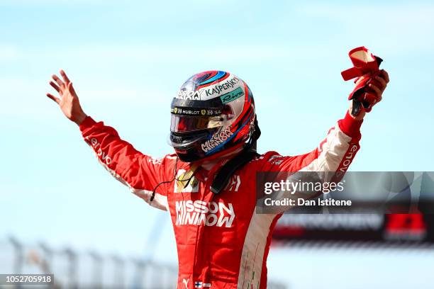 Kimi Raikkonen of Finland and Ferrari celebrates victory after the United States Formula One Grand Prix at Circuit of The Americas on October 21,...