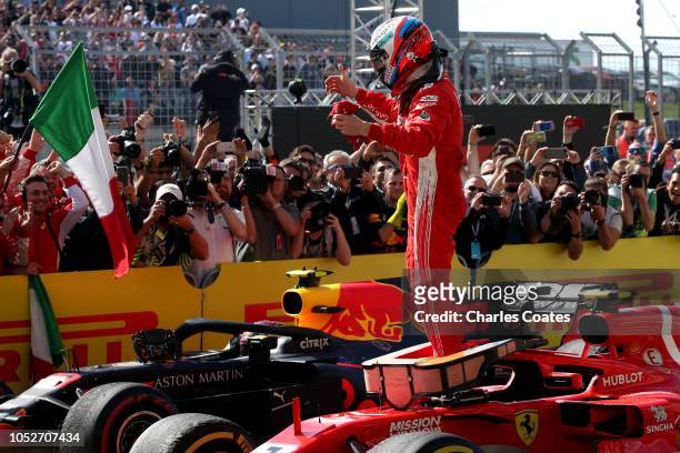 Race winner Kimi Raikkonen of Finland and Ferrari celebrates in parc ferme during the United States Formula One Grand Prix at Circuit of The Americas...