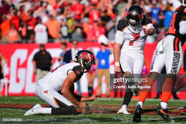 Chandler Catanzaro of the Tampa Bay Buccaneers kicks the game-winning field goal in a 26-23 overtime win against the Cleveland Browns on October 21,...