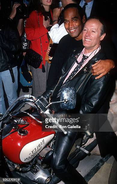 Simpson and Peter Fonda during Grand Opening of The Harley Davidson Cafe at Harley Davidson Cafe in New York City, New York, United States.