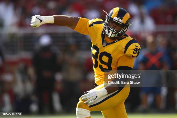 Aaron Donald of the Los Angeles Rams reacts after a sack of C.J. Beathard of the San Francisco 49ers during their NFL game at Levi's Stadium on...