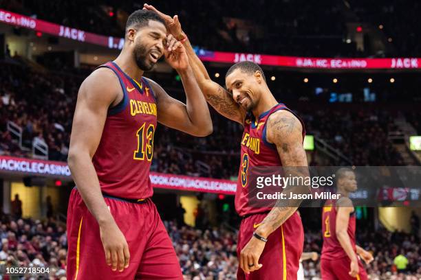 Tristan Thompson reacts as George Hill of the Cleveland Cavaliers teases him after Thompson made a mistake that lead to an Atlanta Hawks basket...