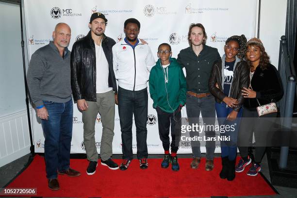 Ice hockey players Ken Daneyko, Chris Higgins and actor Taylor Kitsch and guests attend the MDC Productions 2018 "Face Off to Fight Cancer" charity...