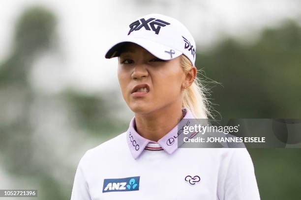 This picture taken on October 21, 2018 shows Lydia Ko of New Zealand reacting at the Shanghai LPGA golf tournament in Shanghai. - Lydia Ko made...