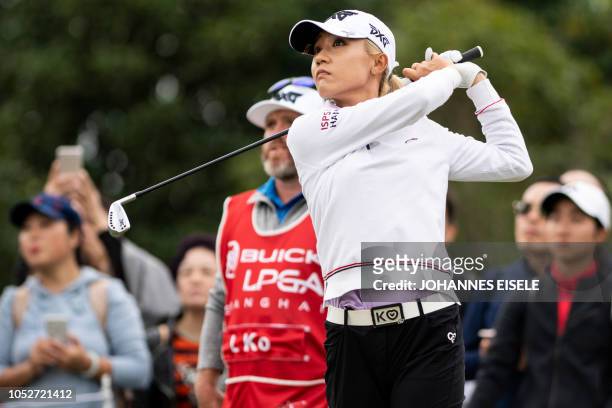 This picture taken on October 21, 2018 shows Lydia Ko of New Zealand teeing off at the Shanghai LPGA golf tournament in Shanghai. - Lydia Ko made...