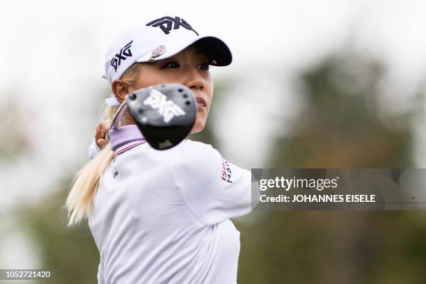 This picture taken on October 21, 2018 shows Lydia Ko of New Zealand teeing off at the Shanghai LPGA golf tournament in Shanghai. - Lydia Ko made...