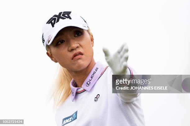 This picture taken on October 21, 2018 shows Lydia Ko of New Zealand gesturing during the Shanghai LPGA golf tournament in Shanghai. - Lydia Ko made...