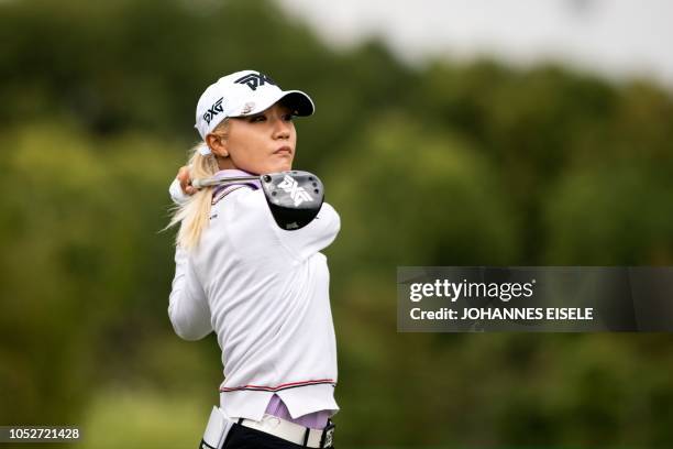 This picture taken on October 21, 2018 shows Lydia Ko of New Zealand teeing off at the Shanghai LPGA golf tournament in Shanghai. - Lydia Ko made...