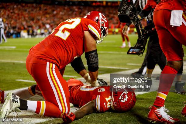 Eric Fisher of the Kansas City Chiefs pretends to provide CPR to teammate Tyreek Hill as a touchdown celebration in the fourth quarter of the game...