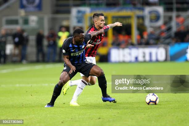 Kwadwo Asamoah of FC Internazionale and Suso of Ac Milan in action during the Serie A match between FC Internazionale and AC Milan. Inter Milan...