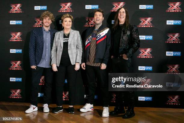 Lodo Guenzi, Mara Maionchi, Fedez and Manuel Agnelli attend X Factor 2018 photocall at Teatro Linear Ciak on October 22, 2018 in Milan, Italy.