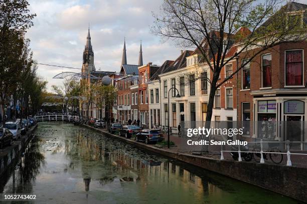 One of many canals runs through the city center on October 19, 2018 in Delft, Netherlands. Delft is home to Delft University of Technology, one of...