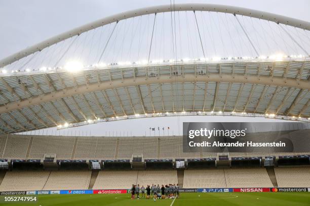 General view as players participate during a training session ahead of their UEFA Champions League Group E match against AEK Athens at Athens Olympic...