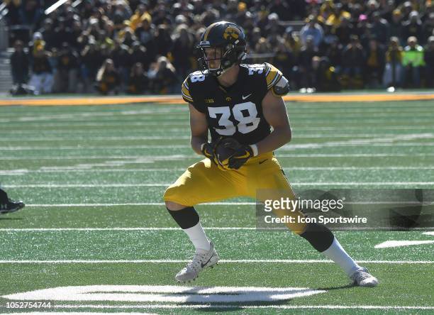 Iowa Hawkeyes tight end T.J. Hockenson runs with the ball after a catch during a Big Ten Conference football game between the Maryland Terrapins and...