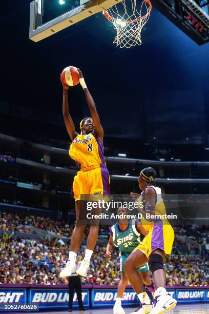 Delisha Milton of the Los Angeles Sparks rebounds during Game Two of the 2001 WNBA Finals on September 1, 2001 at the Staples Center in Los Angeles,...