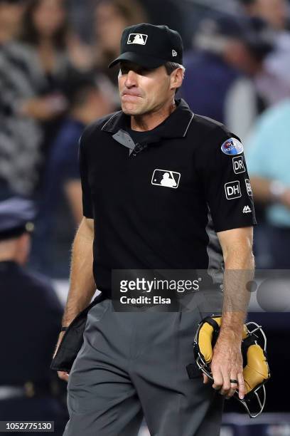 Home plate umpire Angel Hernandez looks on during Game Four American League Division Series at Yankee Stadium on October 09, 2018 in the Bronx...