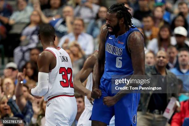 DeAndre Jordan of the Dallas Mavericks reacts after scoring against Kris Dunn of the Chicago Bulls in the third quarter at American Airlines Center...