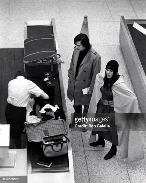 Robert Evans and Ali MacGraw during Ali MacGraw and Robert Evans Arriving from Paris at JFK Airport in New York City, NY, United States.