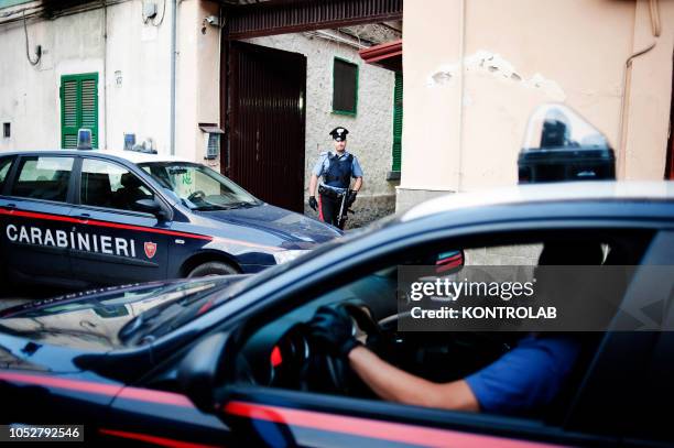 The policemen during a operation in the suburb of Naples, looking for the fugitive mafia, camorra, boss.