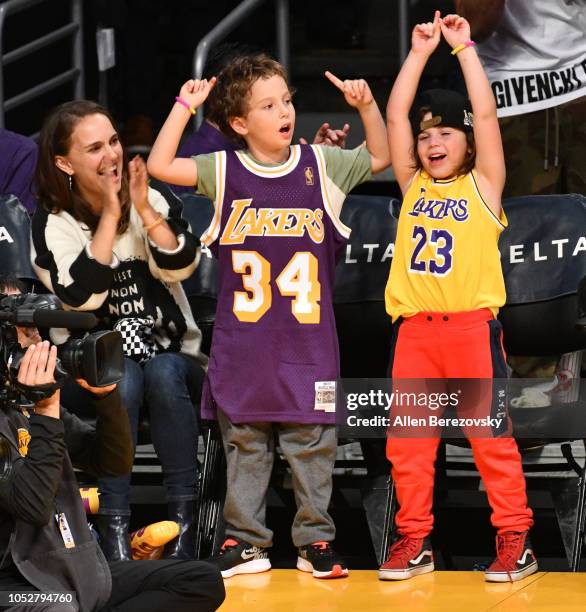 Natalie Portman, her son Aleph Portman-Millepied and a friend attend a basketball game between the Los Angeles Lakers and the San Antonio Spurs at...