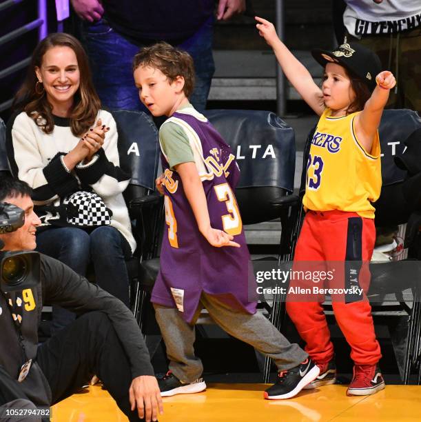 Natalie Portman, her son Aleph Portman-Millepied and a friend attend a basketball game between the Los Angeles Lakers and the San Antonio Spurs at...