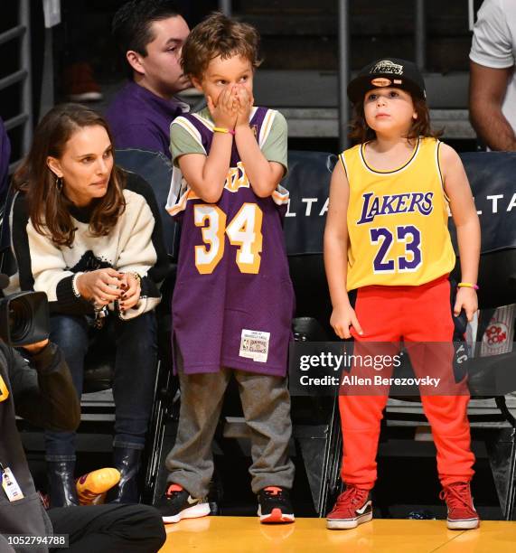 Natalie Portman, her son Aleph Portman-Millepied and a friend attend a basketball game between the Los Angeles Lakers and the San Antonio Spurs at...