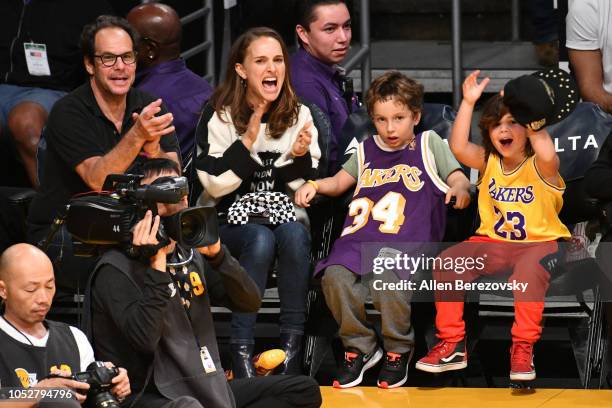 Natalie Portman, her son Aleph Portman-Millepied and a friend attend a basketball game between the Los Angeles Lakers and the San Antonio Spurs at...