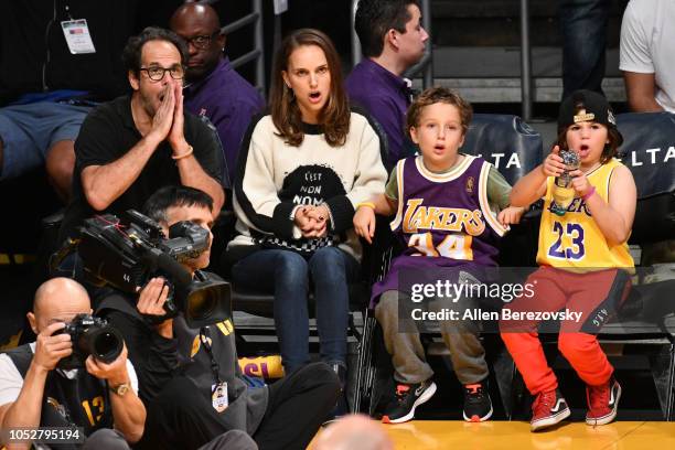 Natalie Portman, her son Aleph Portman-Millepied and a friend attend a basketball game between the Los Angeles Lakers and the San Antonio Spurs at...