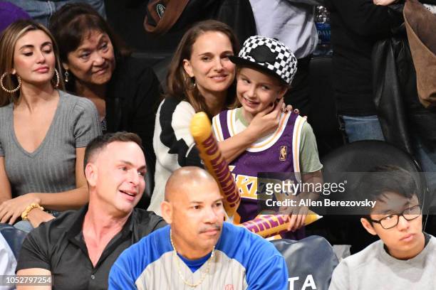 Natalie Portman and her son Aleph Portman-Millepied attend a basketball game between the Los Angeles Lakers and the San Antonio Spurs at Staples...