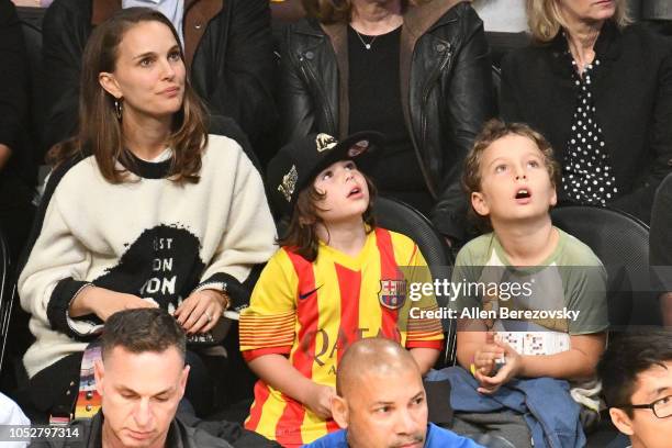 Natalie Portman, her son Aleph Portman-Millepied and a friend attend a basketball game between the Los Angeles Lakers and the San Antonio Spurs at...