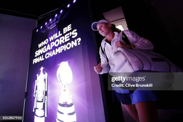 Caroline Wozniacki of Denmark reacts to walks onto the court prior to her singles match with Petra Kvitova of the Czech Republic prior to their...