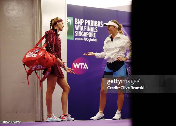 Caroline Wozniacki of Denmark reacts to walks onto the court prior to her singles match with Petra Kvitova of the Czech Republic prior to their...