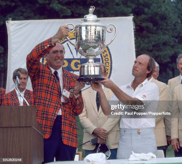 Larry Nelson of the United States is presented the Wanamaker Trophy after winning the 1981 US PGA Championship at the Atlantic Athletic Club in...