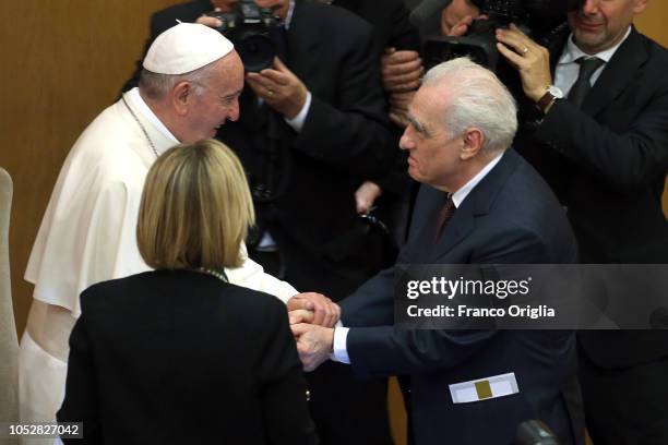 Pope Francis greets Martin Scorsese at the Augustinianum Institute on October 23, 2018 in Rome, Italy. Pope Bergoglio spoke with some young people, a...