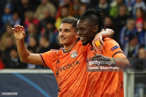 Bertrand Traore of Olympique Lyonnais celebrates after scoring his team's first goal during the Group F match of the UEFA Champions League between...