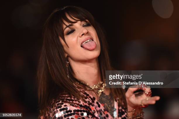 Asia Argento walks the red carpet ahead of the "Noi Siamo Afterhours" screening during the 13th Rome Film Fest at Auditorium Parco Della Musica on...